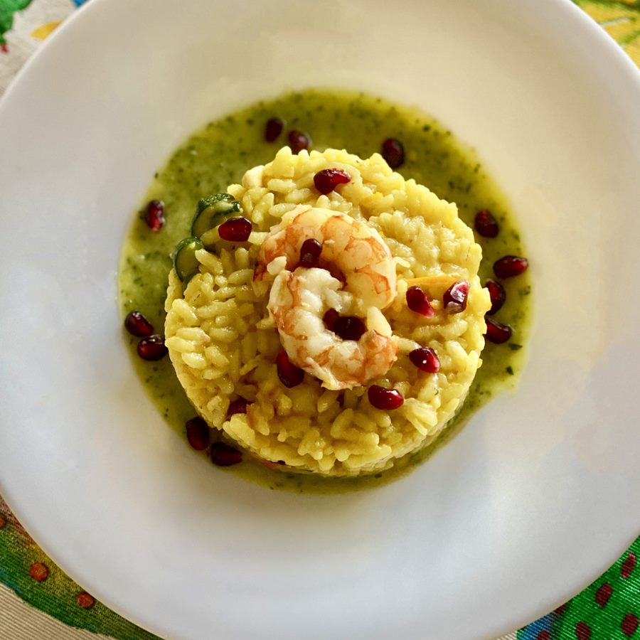 Risotto con gamberi, zucchine e melagrana